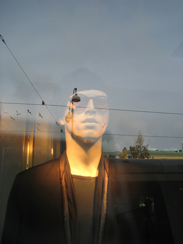 Mannequin in shop window.