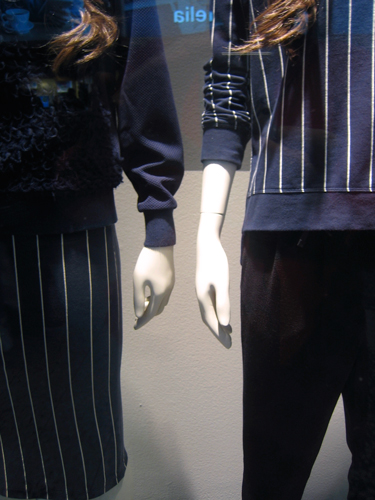 Mannequins in shop window.